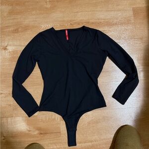 Spanx Women's Suit Yourself Long Sleeve Thong Bodysuit in Black